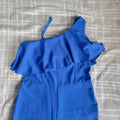 Jumpsuit azul de pierna ancha para niña