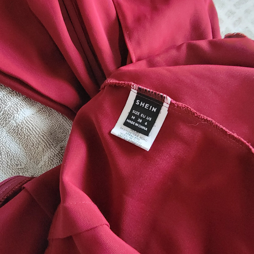 Enterizo Elegante Color Vino con Encaje y Mangas Transparentes